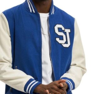 Blue varsity fleece jacket with faux leather sleeves front view